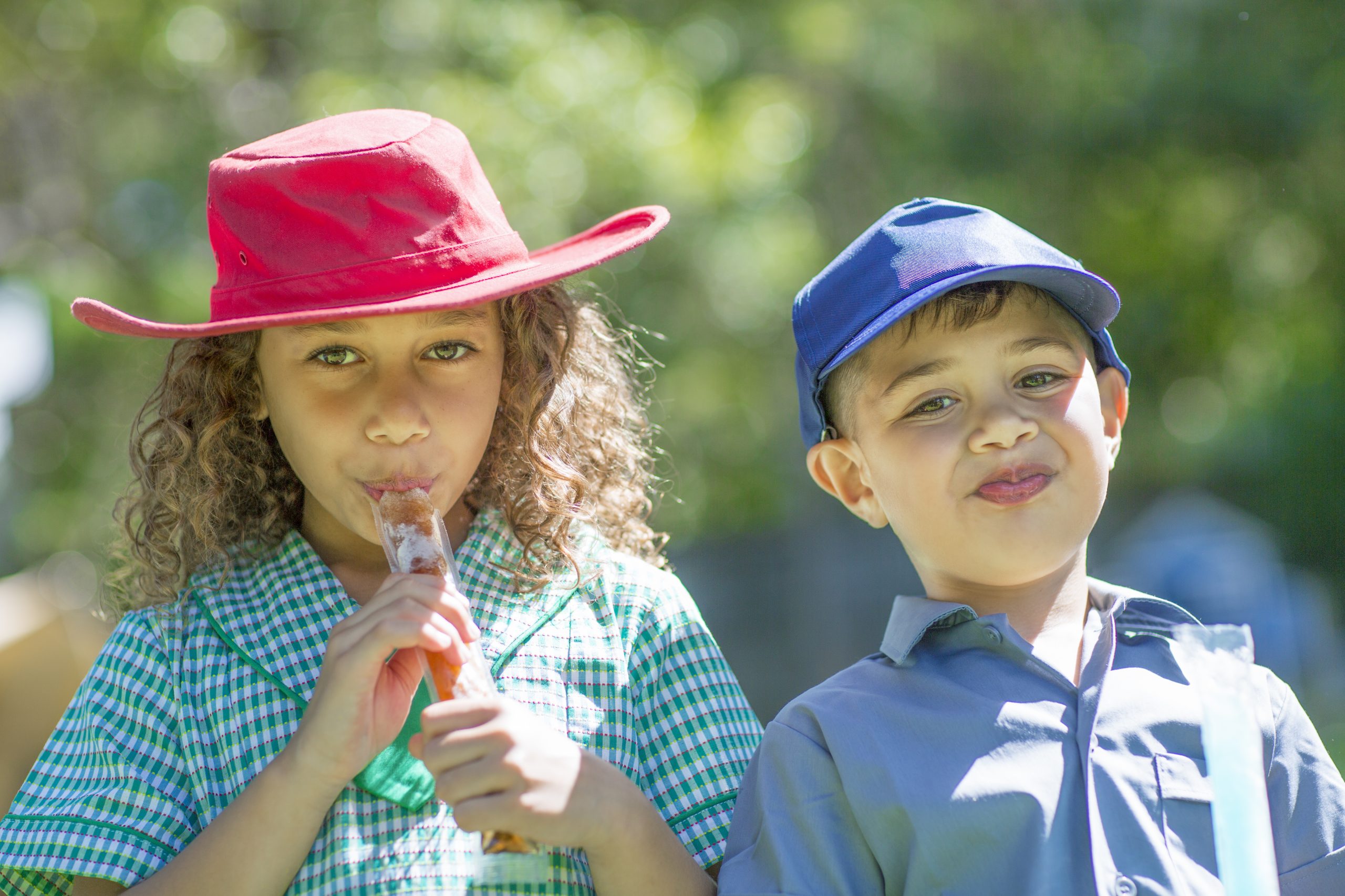 Aboriginal children enjoying ice pops